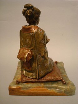 Ancient bronze figure